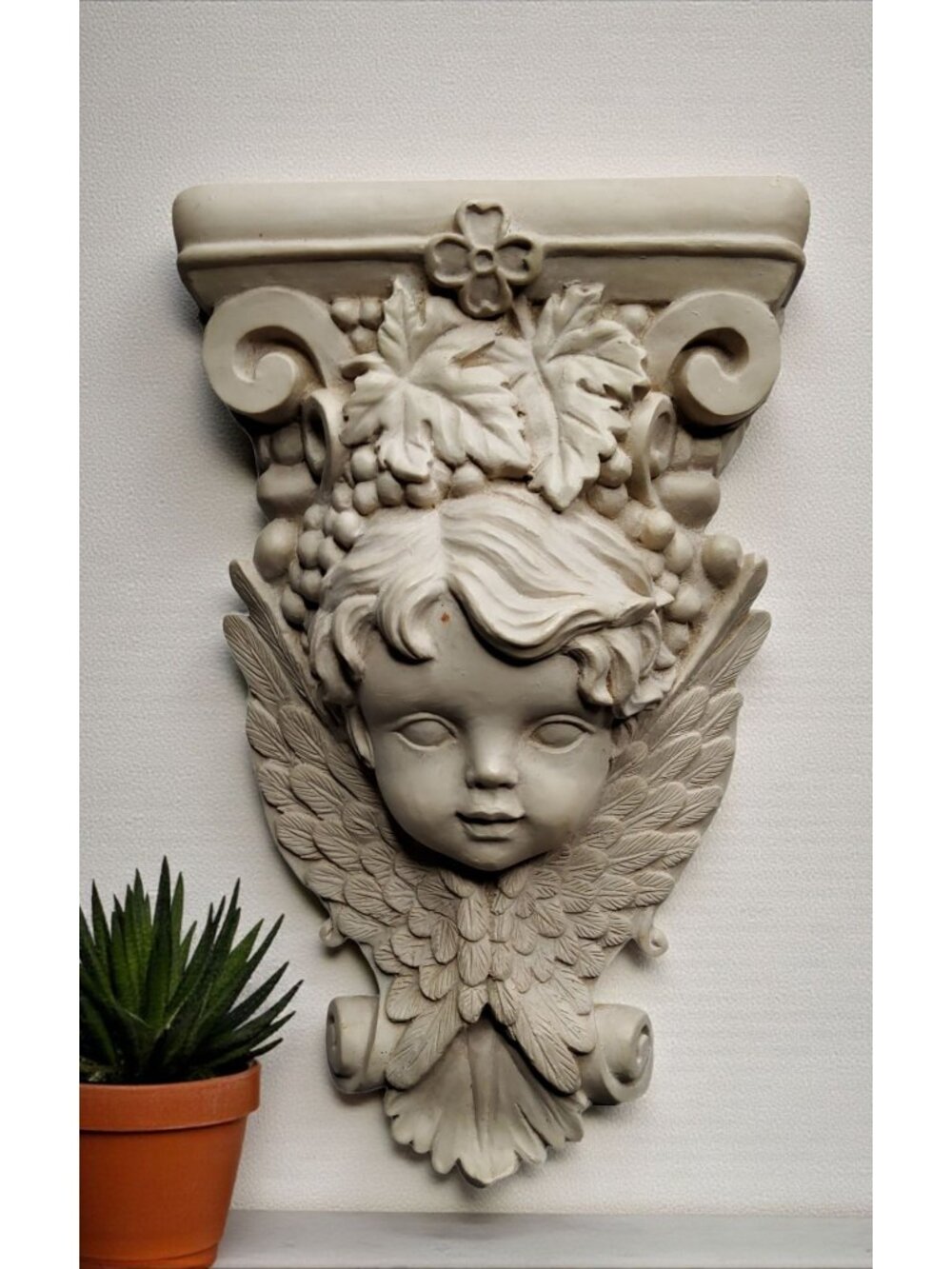 vintage victorian double winged cherub white molded resin wall pocket sculpture.